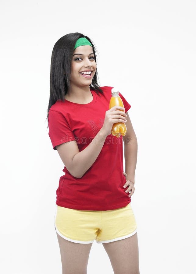 Asian girl with bottle of juice