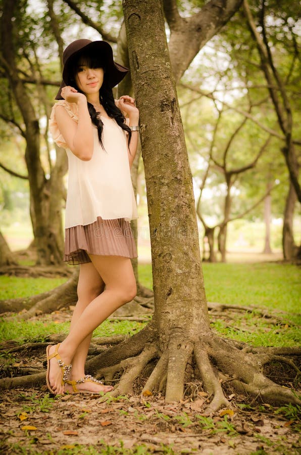 Asian girl in garden