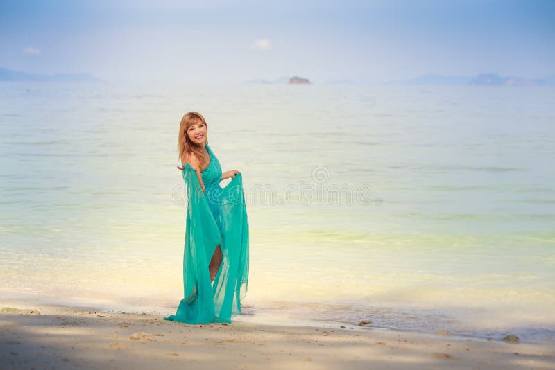 Asian girl in green dress