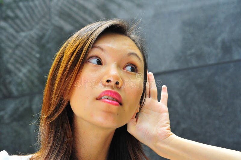 Asian Girl Hand Gesture - Hearing 1