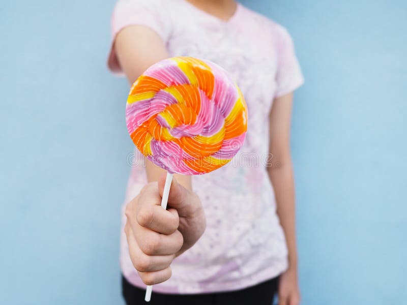 Asian Girl Holding Colorful Lollipop on Hand Stock Photo - Image of ...