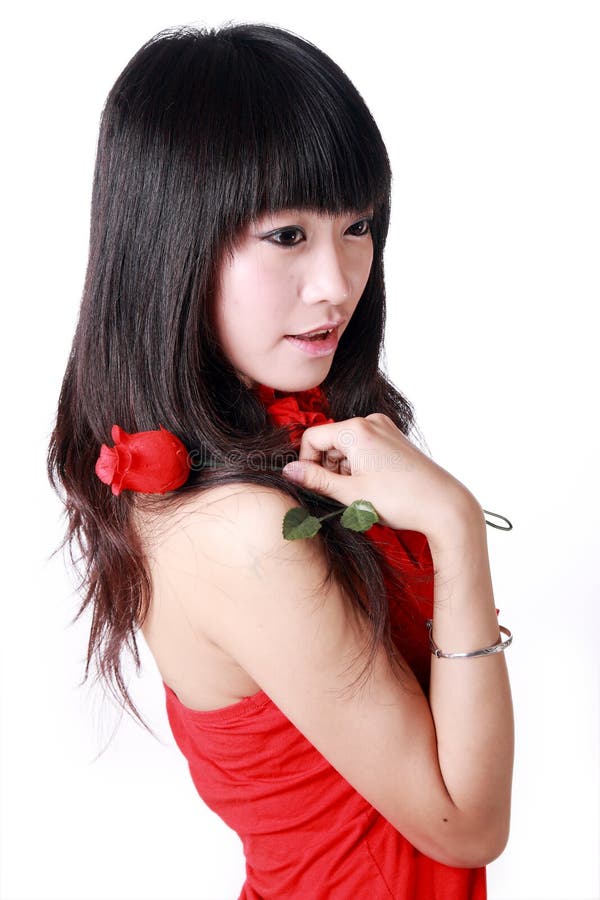 Asian girl holds a rose