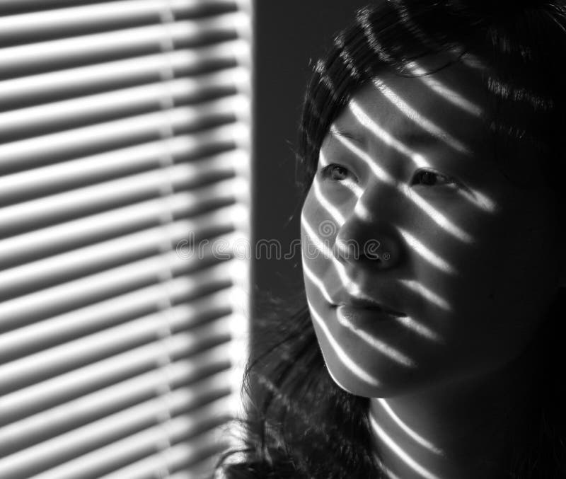 Asian Girl Next To Window