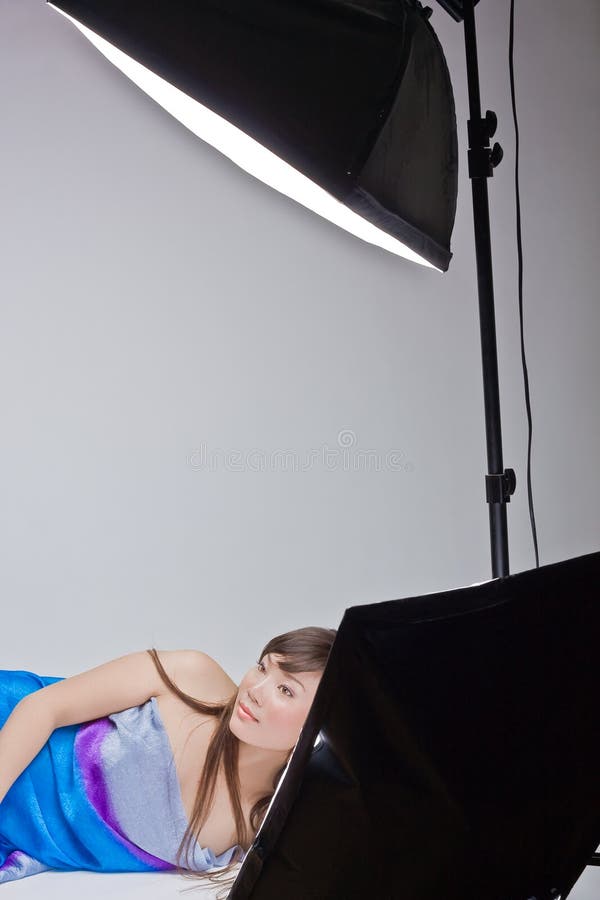 Asian girl posing in studio royalty free stock photo