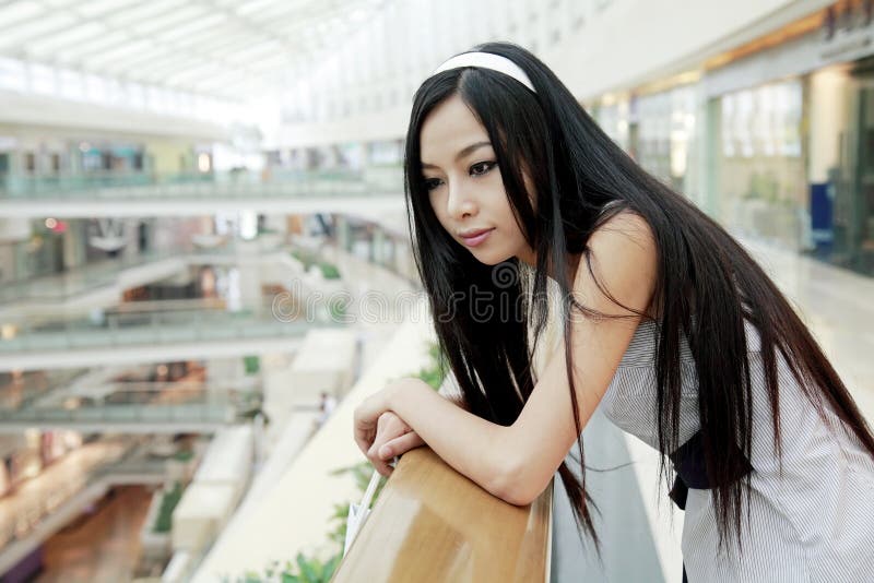 Asian girl in shopping mall.