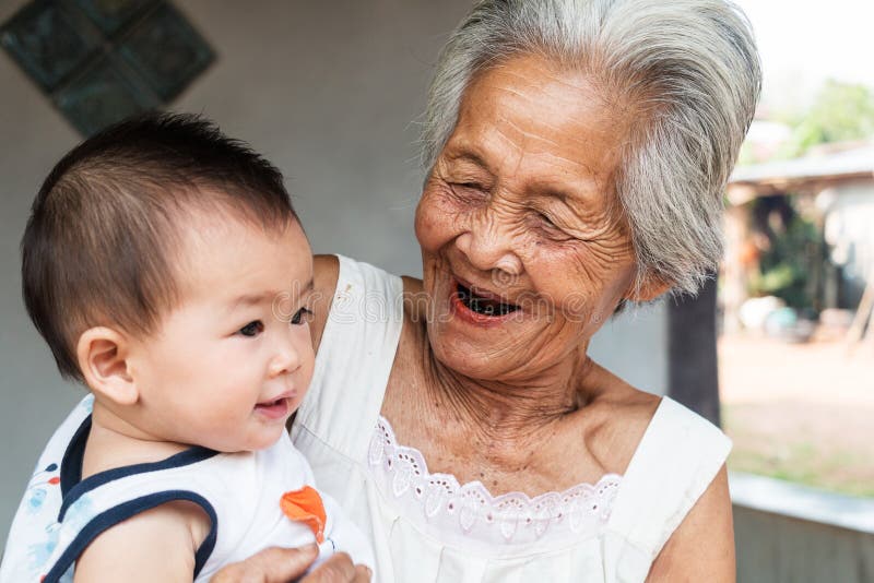 Asian Grandmother with baby