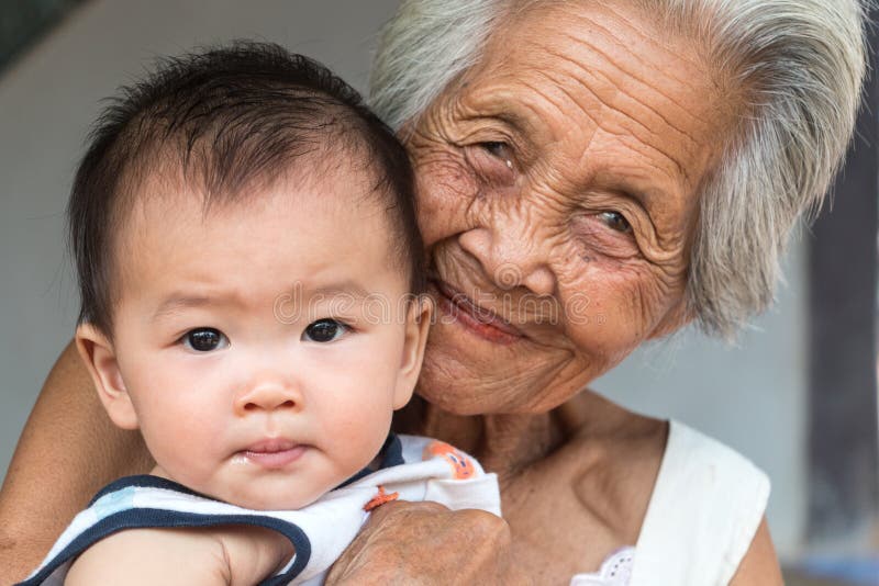 Asian Grandmother with baby