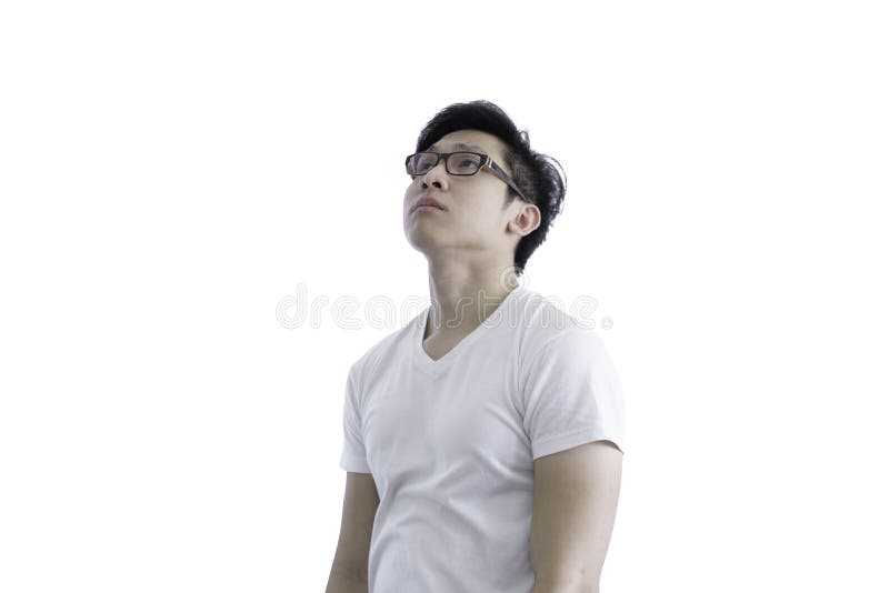 Asian handsome man with white shirt and orange eyeglasses has disappointed for luck isolated on white background and clipping paths adult appeal bad begging believe black boy brown crossed expression fashion forgiveness god help hope idea looking male model person portrait pray pressure relief request serious smart sorry stalwart strengh thinking tired up wish worker young