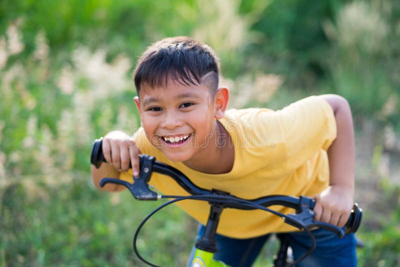Asian Kid Boy Ride Bicycle in Nature Stock Image Image of young