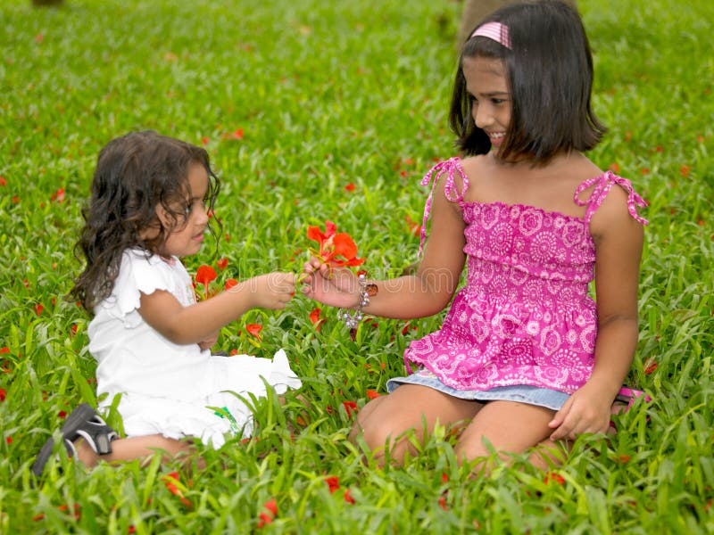 Asian kids playing in a park