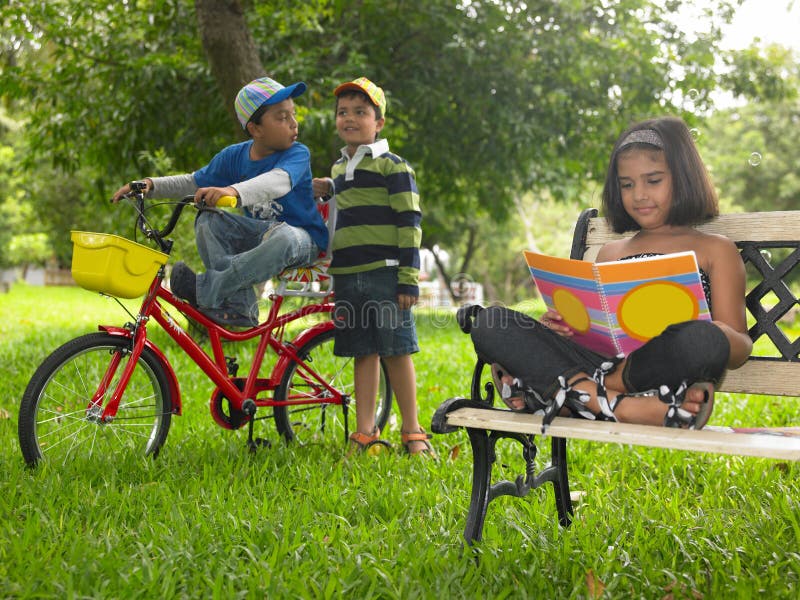 Asian kids playing in the park royalty free stock images Asian kids playing in the park royalty free stock images
