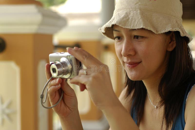 Asian Lady With Camera