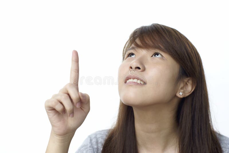 Asian lady pointing up royalty free stock images Asian lady pointing up royalty free stock images