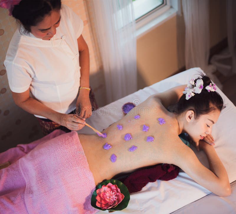 Asian lady relax in skin care aroma therapy and scrub spa stock photo Asian lady relax in skin care aroma therapy and scrub spa stock photo