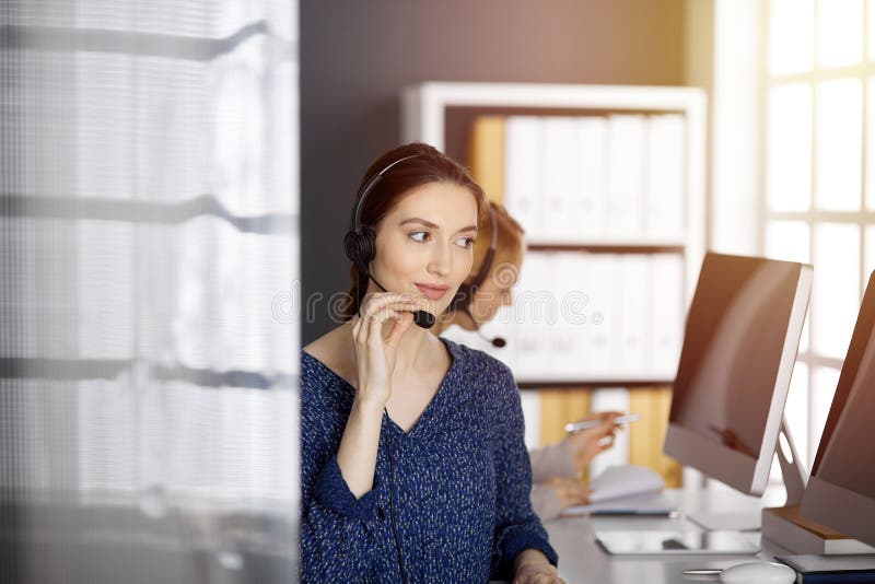 Asian or Latin American Businesswoman Talking by Headset in Sunny Office.  Call Center and Diverse People Group in Stock Photo - Image of girl,  caucasian: 231530006