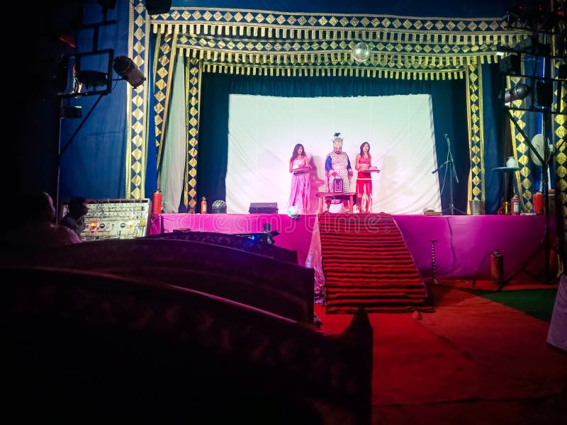 Asian Magical Show Performance on Stage with Colorful Lighting Setup in