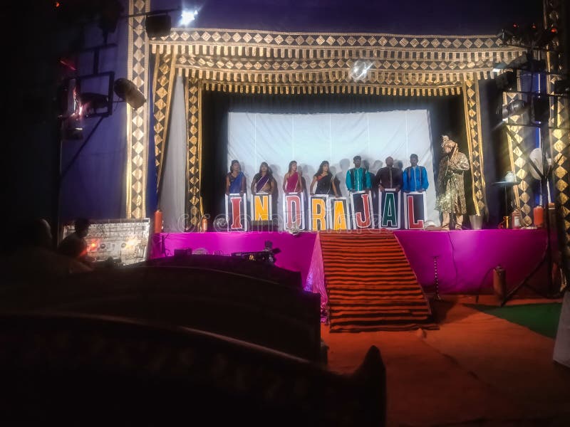 Asian Magical Show Performance on Stage with Colorful Lighting Setup in