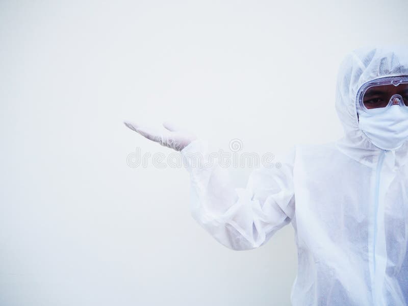 Asian male doctor or scientist in PPE suite uniform showing hands open palms with copy space for text or design. coronavirus or royalty free stock photos