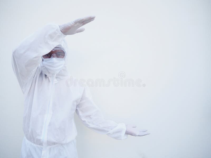 Asian male doctor or scientist in PPE suite uniform showing his hands gesture with copy space for text or design. coronavirus or stock images