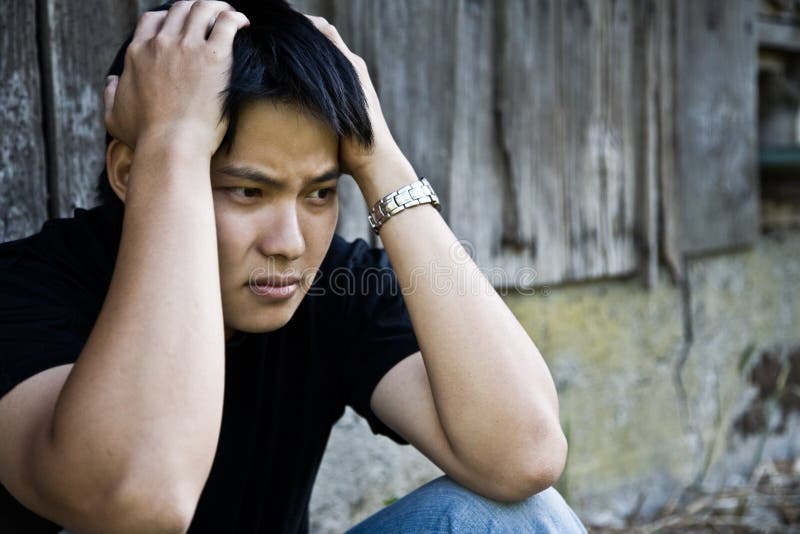 asian male stressed στοκ εικόνα asian male stressed στοκ εικόνα