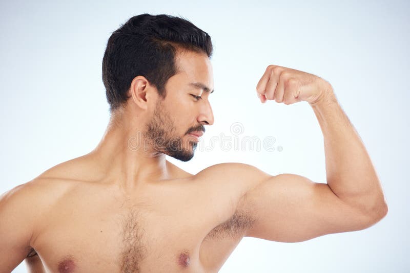 Fitness, biceps and man with measuring tape on arm, check muscle growth and  development in training exercise. Workout, gym and happy healthy  bodybuilder measuring bicep muscles, health and wellness. Photos
