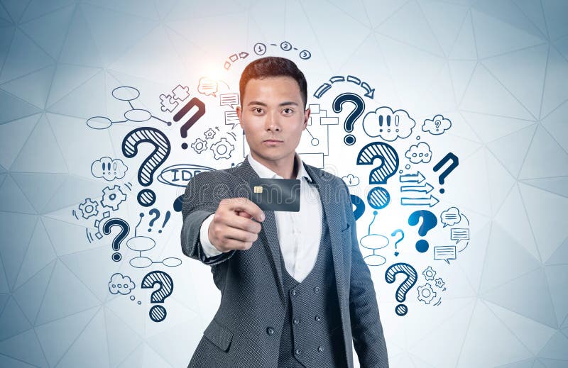 https://thumbs.dreamstime.com/b/asian-man-credit-card-question-marks-serious-young-businessman-showing-standing-near-gray-wall-business-sketch-drawn-190065624.jpg