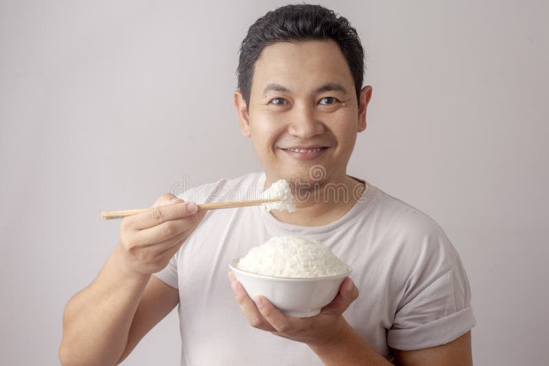 Asian Man Eating Rice stock photo. Image of funny, japanese - 144957654 Asian Man Eating Rice stock photo. Image of funny, japanese - 144957654