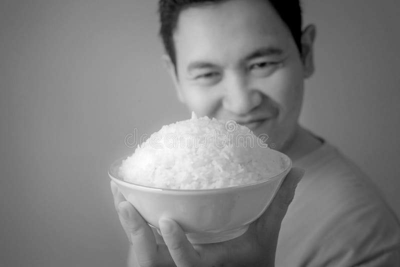 Asian Man Eating Rice stock photo. Image of culture - 151755798