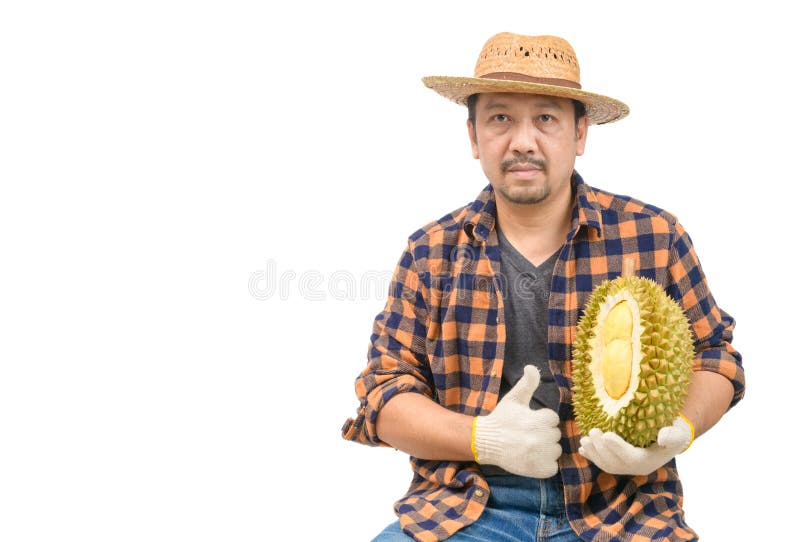 Asian man farmer holding Mon Thong Durian isolated on white background royalty free stock photos