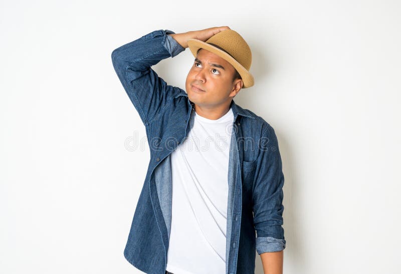 Asian Men Around The Age Of 27 35 Are Thinking And Making Faces Confused Not Understanding Wondering With Something This Photo Stock Image Image Of Choose People