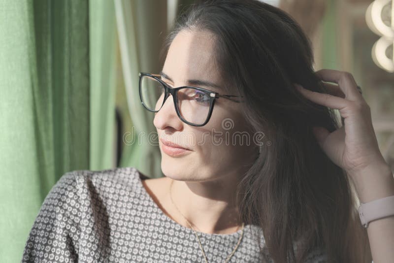 Asian or Middle East Woman Wearing Eyeglasses Looking Aside and Touching  Her Hair. Getting Rest or Break in Office Stock Image - Image of middle,  thinking: 232446337