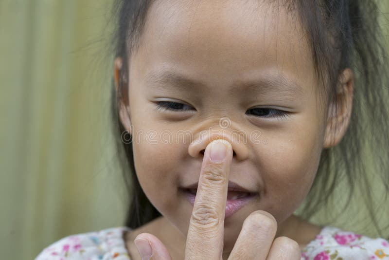 Asian Mother and Child Girl Playing Pinch Cheeks, Touch Nose Funny Face