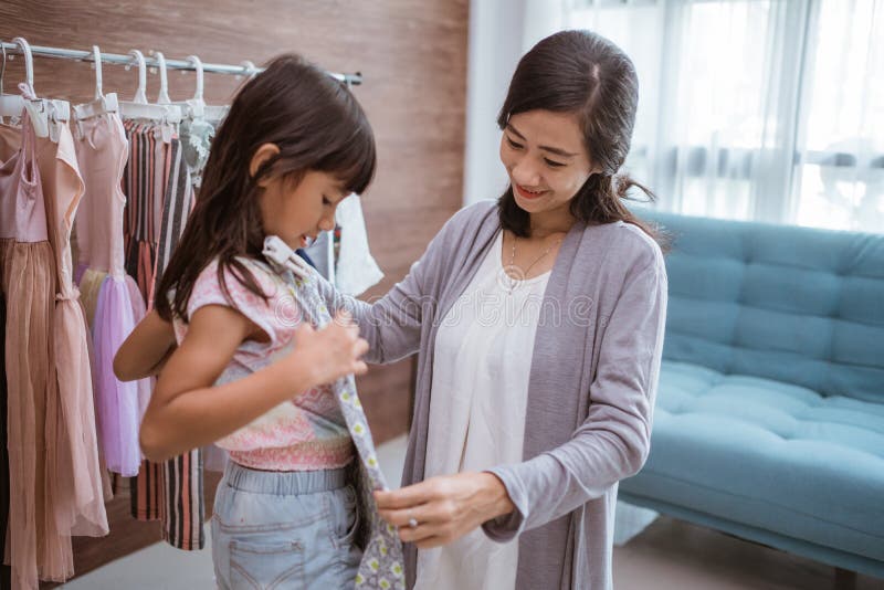 Asian Mother Shopping with Her Daughter at Boutique Clothing Shop Stock Photo - Image of centre