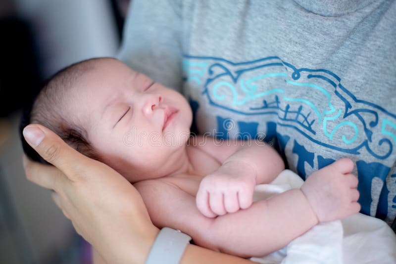 Asian newborn. Lovely kid and little child of parent. royalty free stock images Asian newborn. Lovely kid and little child of parent. royalty free stock images