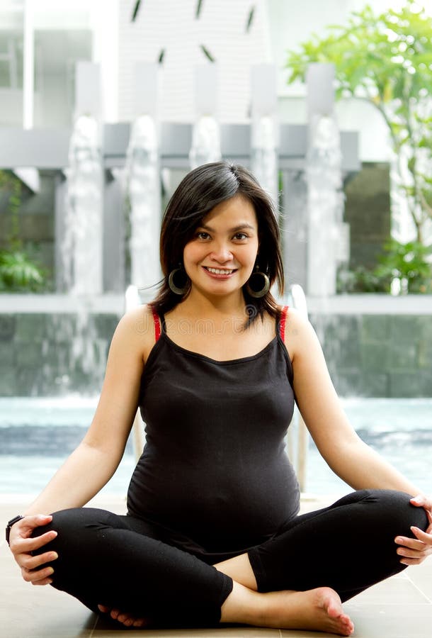 Asian pregnant woman exercise