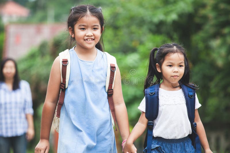 Asian Pupil Kids Holding Hand and Going To School Stock Image - Image ...