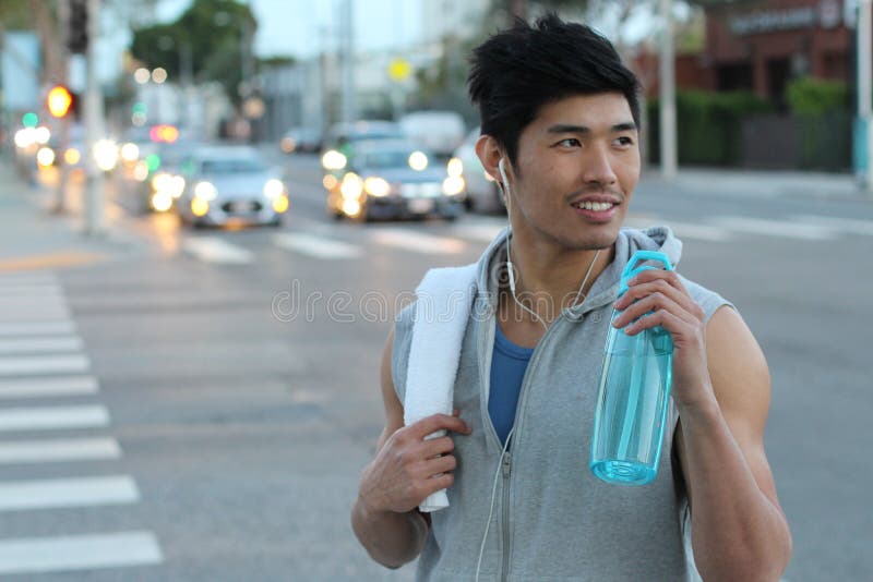 Asian Runner Drinking a Sports Drink Stock Image Stock Photo Image