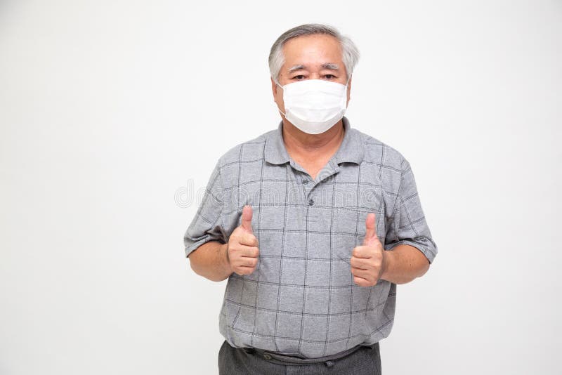 Senior man wearing a protective face mask.
