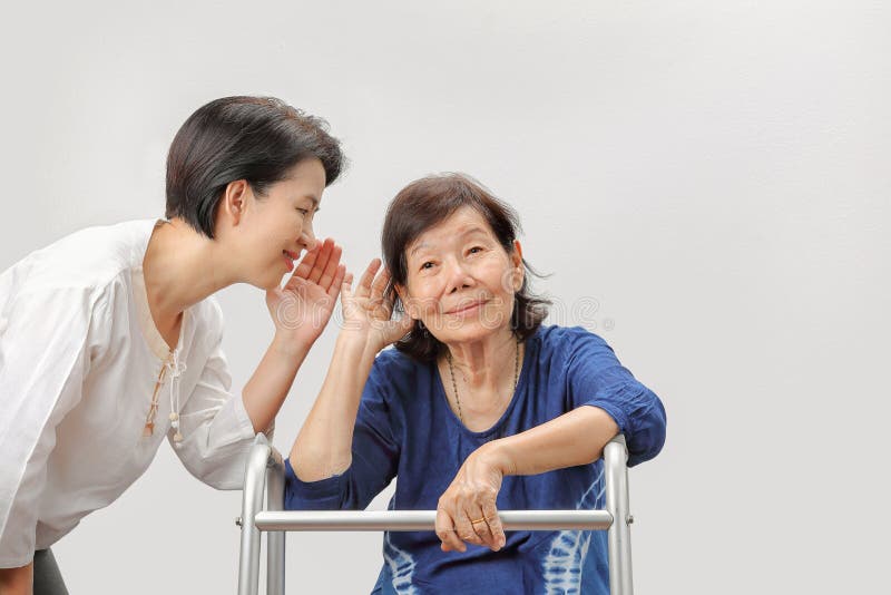 Asian seniors woman hearing loss. Asian seniors women hearing loss , Hard of hearing stock photo
