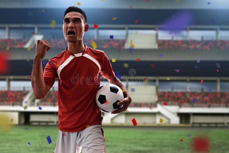 Asian soccer player celebrating goal