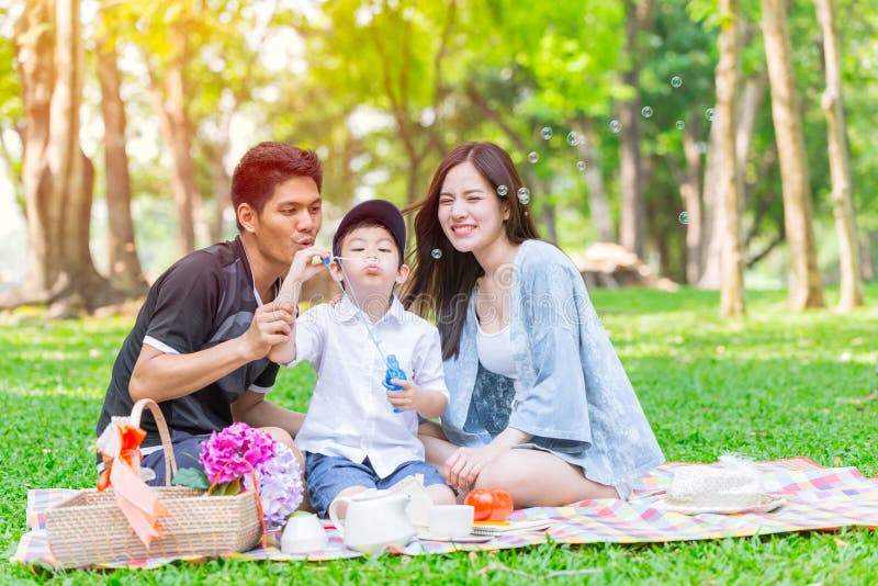 Asian teen family happy holiday picnic royalty free stock image Asian teen family happy holiday picnic royalty free stock image