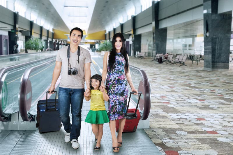 Asian tourist arrive in airport stock photo