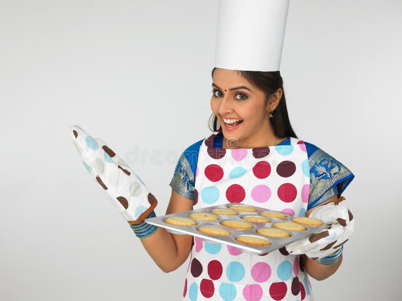 Asian woman baking cookies royalty free stock photos Asian woman baking cookies royalty free stock photos