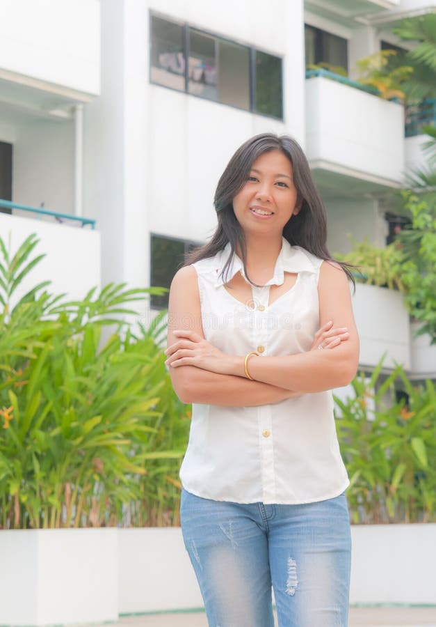 An Asian Woman Chill Out in Her Urban Living Area Stock Image - Image
