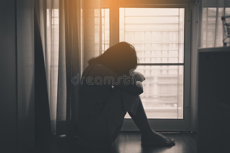 Asian woman depression have a headache of lonely in bedroom,Black and white toned