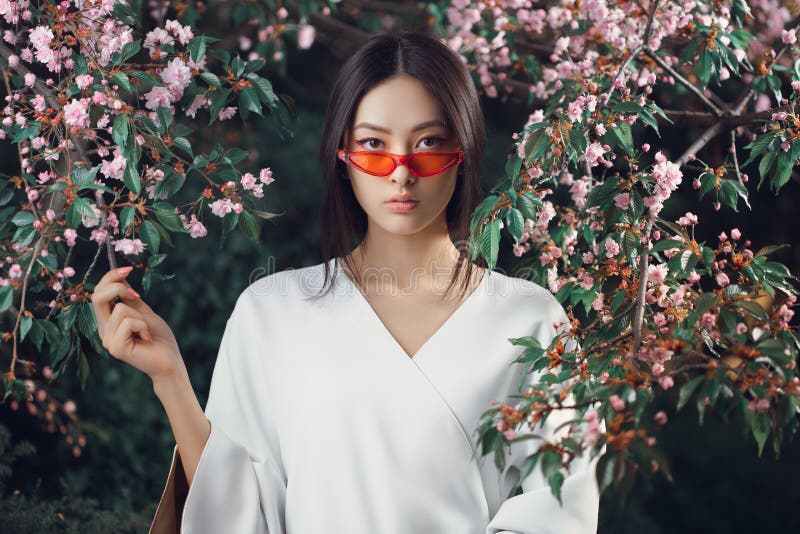 Asian woman fashion close-up portrait outdoors