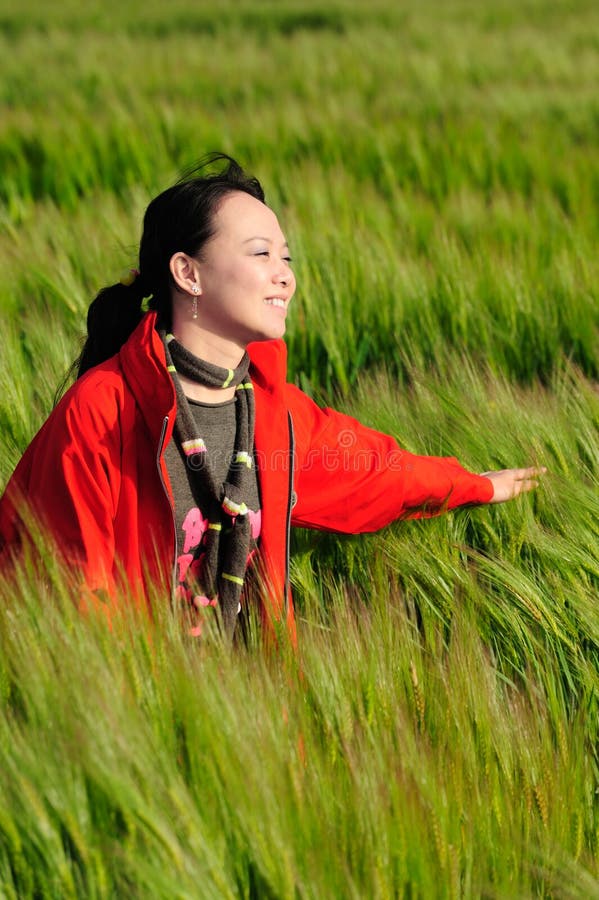 Asian woman grass in red