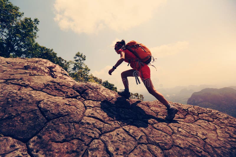 Asian Woman Hiker Climbing Rock on Mountain Peak Cliff Stock Photo ...