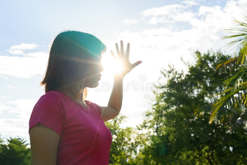 Asian woman in hot summer - heat stroke concept