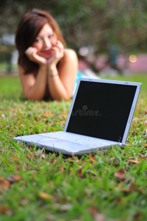 Asian Woman In The Park